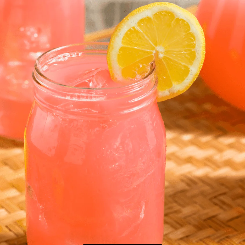 Sutter Home Strawberry Lemonade with a vibrant pink in color and slice of lemon on the rim